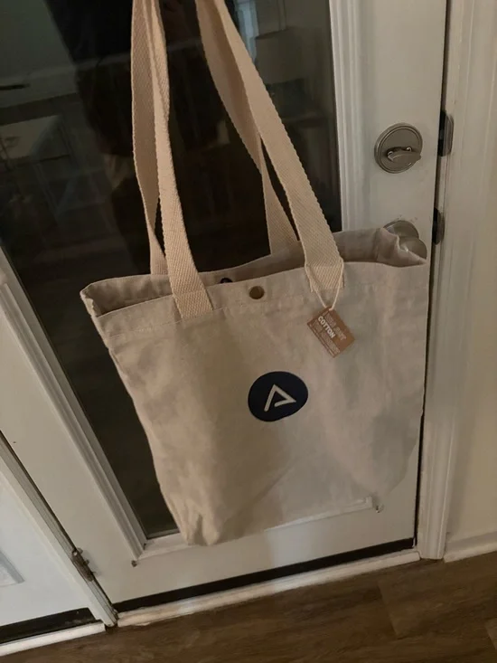 Neutral Canvas Tote Bag with Navy Logo - Picture 2 of 4